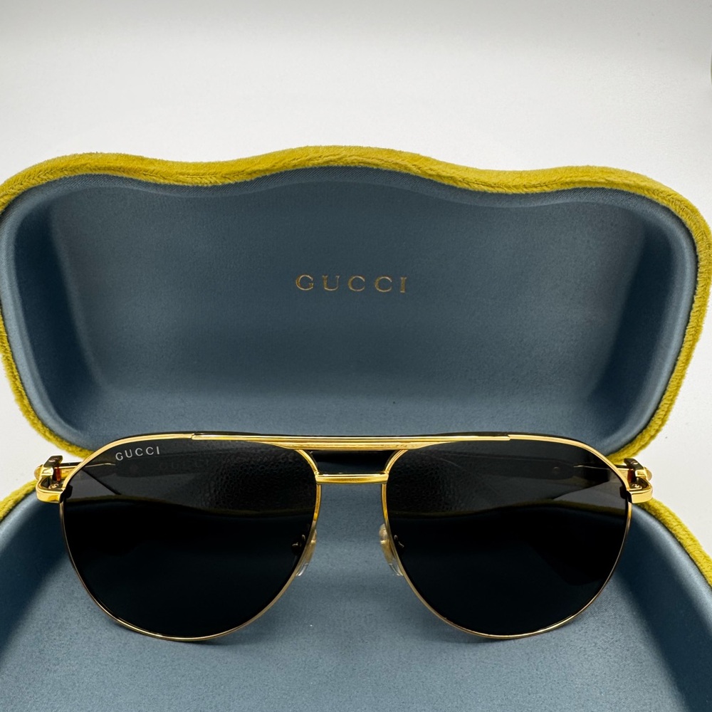 Gucci Gold Frame Sunglasses with Black Lenses